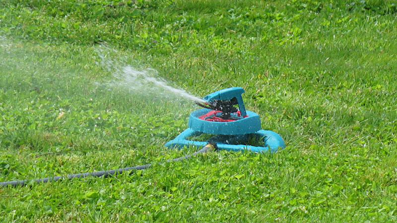 Gilmour-adjustable-pattern-master-sprinkler-in-lawn