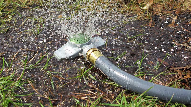 watering-with-stationary-sprinkler
