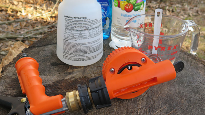 showing-hose-end-sprayer-and-cleaning-ingredients